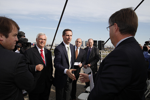 Premier McGuinty receiving congratulations following the announcment.