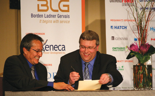 Regional Chief Angus Toulouse of the Chiefs of Ontario and Ian Kerr, Chair of the OWA Board of Directors, signing the letter of intent, October 18