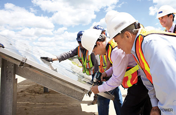Installing panels at SkyPower’s Ryerse 13th Road solar farm	Courtesy SkyPower