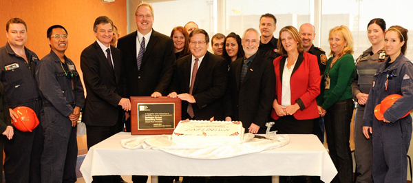 Ontario Power Generation and the Darlington Nuclear team were awarded the prestigious Award of Excellence on November 6 – a distinction reserved for the top-performing nuclear power stations in the world. The award recognizes achievements in industry-leading innovation in safety, operations and management. Pictured, from left to right starting with the Minister, are Energy Minister Chris Bentley, Brian Duncan, Senior Vice President, Darlington, Tom Mitchell, OPG President and CEO, Adrian Foster, Mayor of Clarington, Sheila Hall, Clarington Board of Trade and additional OPG employees.