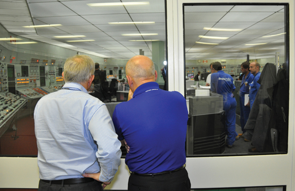 Bruce Power President and CEO Duncan Hawthorne explains the inner workings of a nuclear facility’s Main Control Room to Minister of Energy Hon. Bob Chiarelli during the Minister’s tour of Bruce A on October 7.