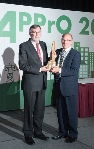 Jan Carr receiving the Hedley Palmer Award at the APPrO Canadian Power Banquet, November 19, 2013.