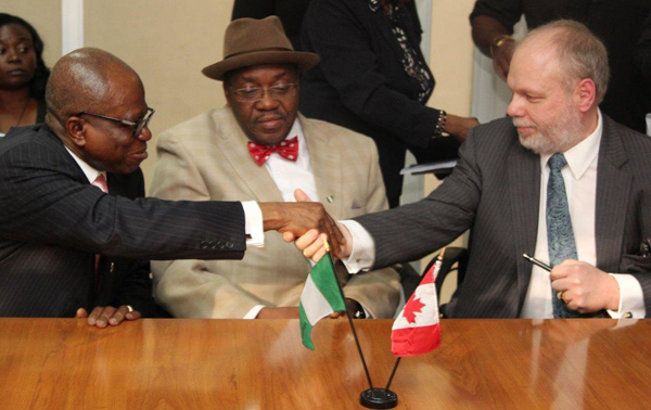 Nigeria High Commissioner, Chief Ojo Uma Maduekwe (left), Permanent Secretary, Federal Ministry of Power, Ambassador (Doctor) Godknows Boladei Igali (centre), and SkyPower Global‘s Vice President of Development for Africa, Benoit Fortin (right) following the signing of the agreements in Abuja, Nigeria. (CNW Group/SkyPower FAS Energy).