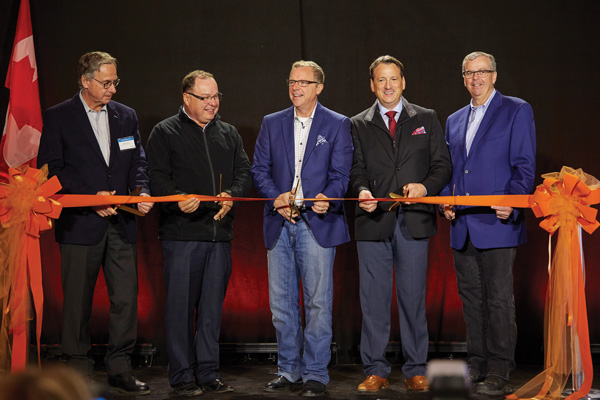 SaskPower Board Chair Rob Pletch (left to right); the Honourable Bill Boyd, Minister Responsible for SaskPower; Saskatchewan Premier Brad Wall; the Honourable Greg Rickford, Canada’s Minister of Natural Resources; and SaskPower President and CEO Robert Watson cut the ribbon at the official launch of the Boundary Dam carbon capture and storage facility in Estevan on Oct. 2, 2014.